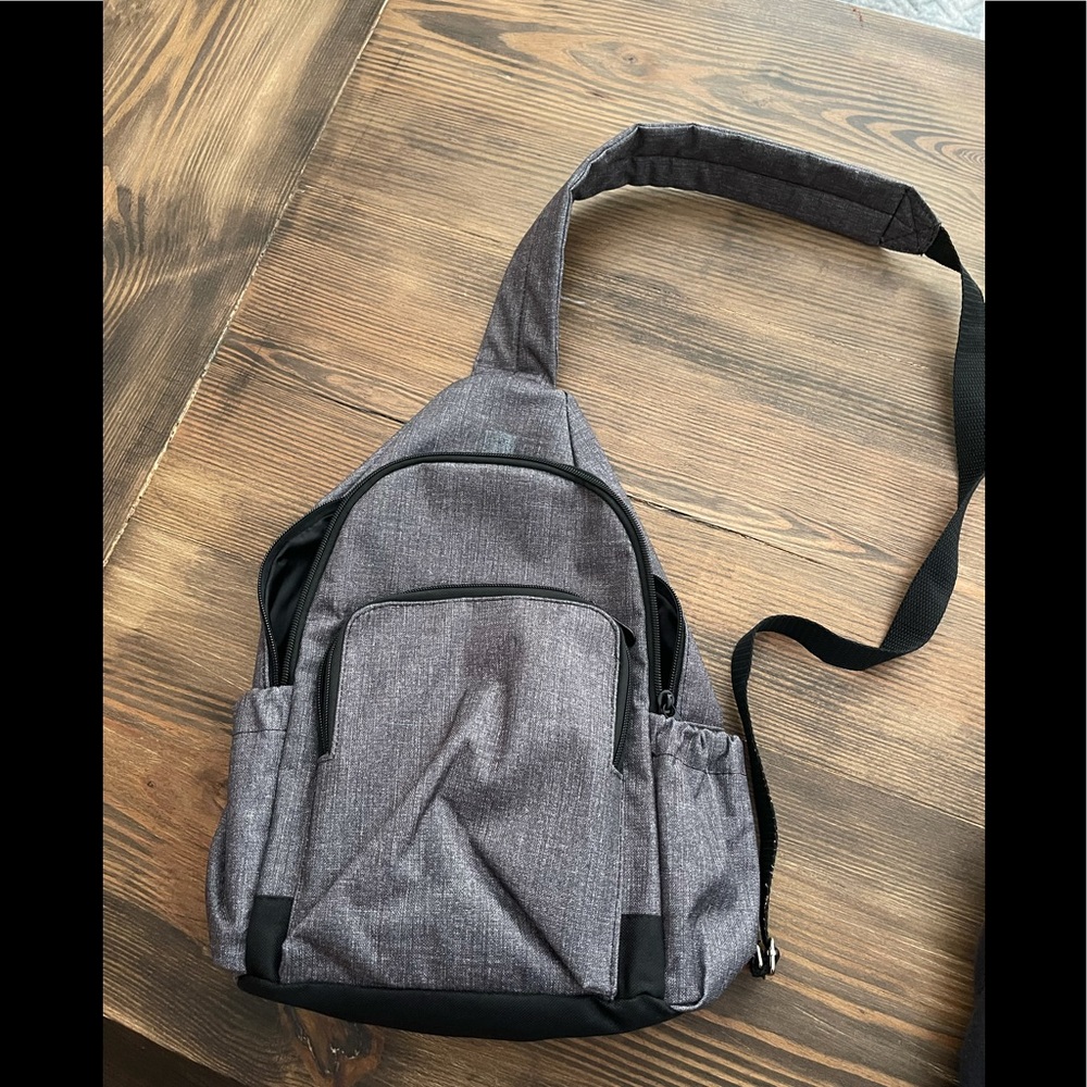 Thirty one adjustable sling backpack